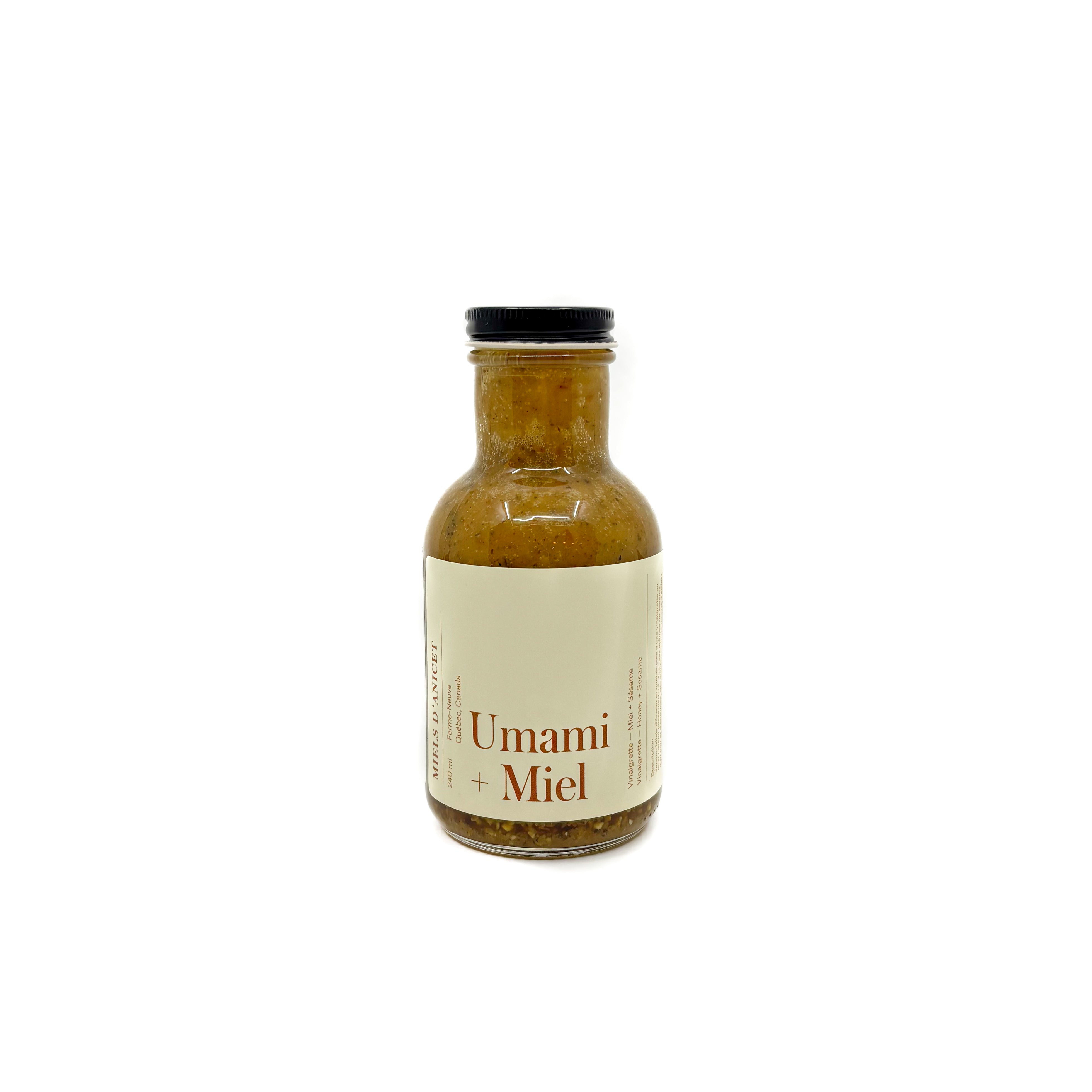Bouteille de vinaigrette Umami + Miel de Miels d'Anicet sur fond blanc
