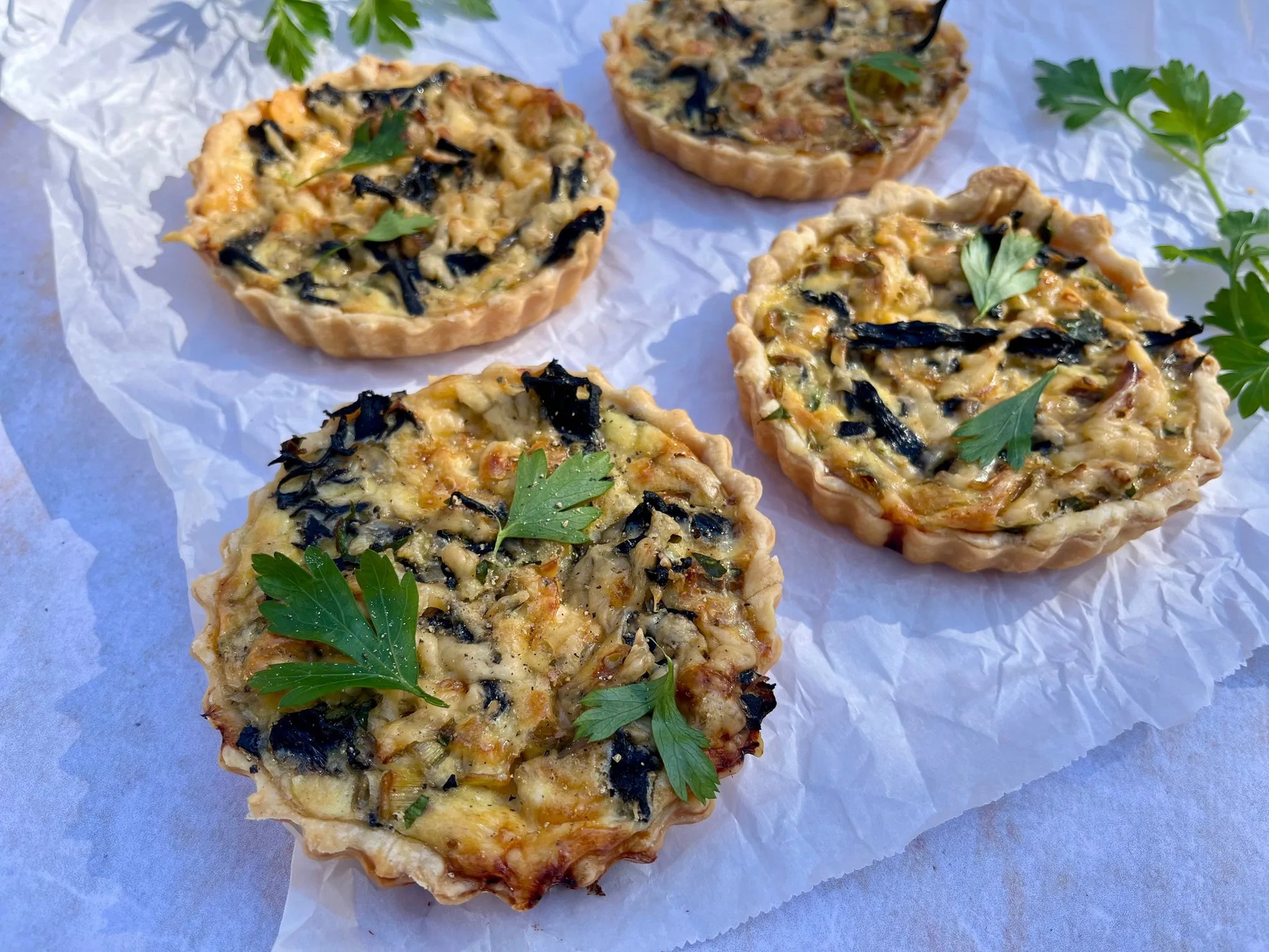 Mushroom quiche with black trumpets and leeks